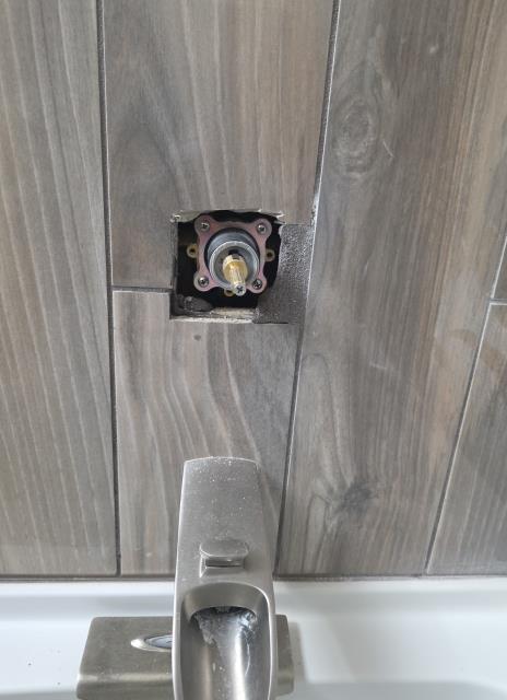 We responded to our customer in Woodstock, GA after they reported low water pressure at the tub and shower, especially on the hot side. Upon inspection, we found debris in the hot water lines from an older 30 year old water heater, restricting flow. We removed the shower cartridge and flushed the hot water lines to clear the buildup. We then replaced the water heater and installed a new cartridge to restore proper performance. After completing the work, we tested the system for proper pressure, operation, and leak free performance. 