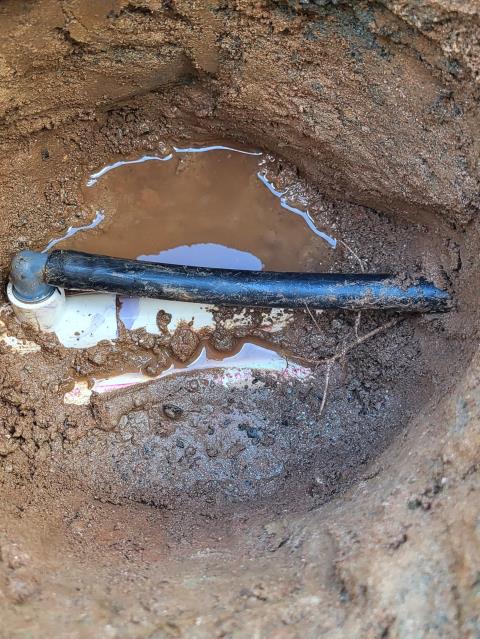 We responded to our customer in Alpharetta, GA after they reported a leak in the sprinkler line under the turf. Upon inspection, we located a pinhole leak in an elbow fitting beneath the astro turf. We cut out the damaged section and replaced the faulty elbow to restore proper flow. After completing the repair, we turned the system back on and tested for leak free operation.