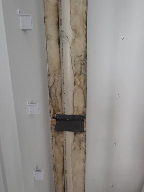 We responded to our customer in Dallas, GA after they reported a water leak in the wall caused by a drilled pipe during shelf installation. Upon inspection, we found the PVC pipe had been punctured, causing the leak. We cut out the damaged section and replaced the PVC piping inside the wall to restore proper water flow. Once the replacement was completed, we tested the line for proper, leak free operation.