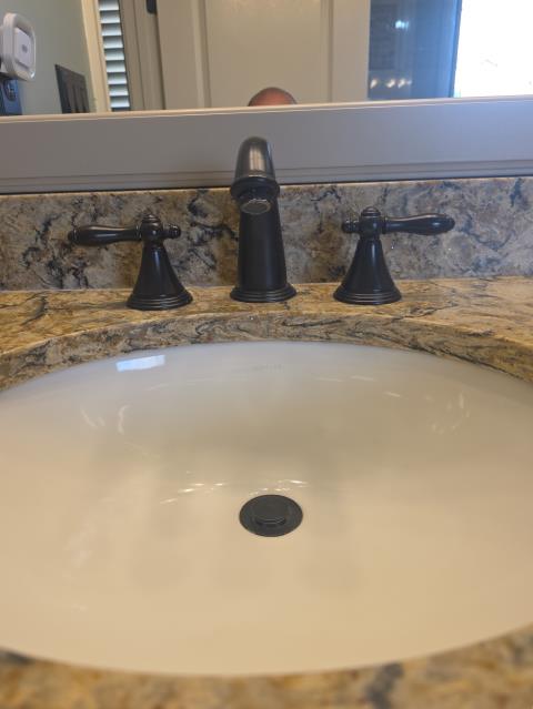 We responded to our customer in Marietta, GA to install two customer supplied 8 inch widespread lavatory faucets in the master bathroom. We removed the existing faucets and installed the new fixtures with stainless steel braided supply lines for reliable connections. All fittings were properly secured during installation. After completing the work, we ran water and tested both faucets for proper, leak free operation.