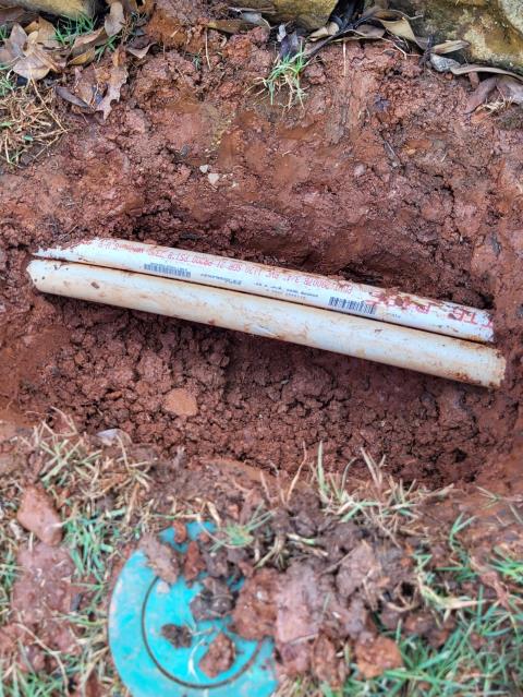 We responded to our customer in Marietta, GA after they reported a leaking sprinkler line in the yard. Upon inspection, we found a broken section of PVC irrigation pipe causing the leak. We excavated the area to access the damaged line and repaired the leaking section of pipe. After completing the repair, we turned the system back on and tested for proper, leak free operation. The sprinkler line is now functioning correctly.