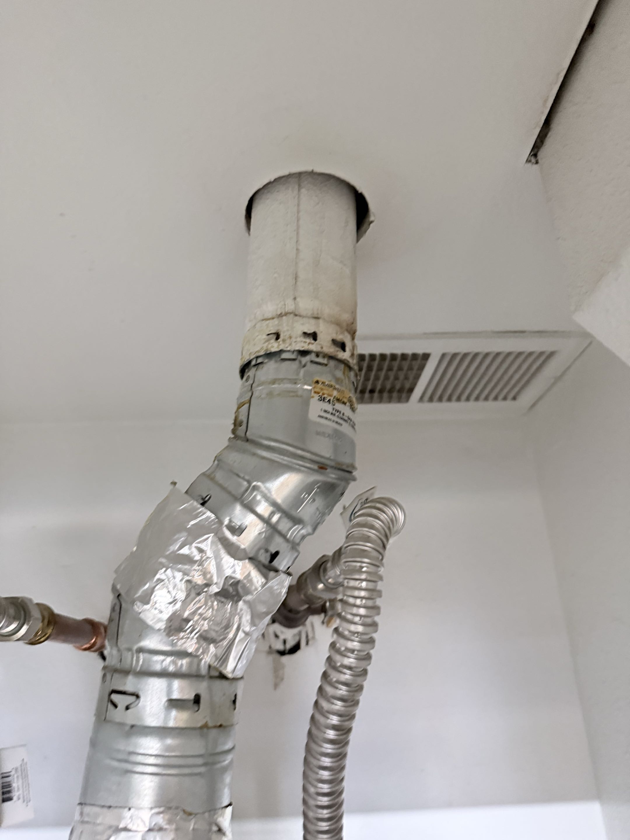 Performed preventative maintenance In Lewisville and found water heater flue pipe disconnected went ahead and reattached for customer 