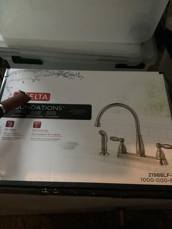 Responded to recurring drain issue in storage room. Cleaned main drain line to restore proper flow. Additionally, provided consultation on sink installation with Delta Foundations kitchen faucet model 21988 to be installed in area currently under construction with unfinished drywall and exposed ceiling joists.