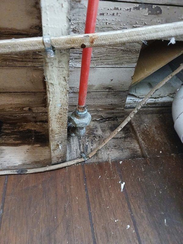 Completed pipe connection repair for client Robert Hill on a time and materials basis. Opened wall sections to access and connect plumbing pipes, installing new PEX piping and connecting to existing metal fittings. Work involved integrating new components with older plumbing infrastructure in basement/crawlspace area as pre-approved by Tessa.