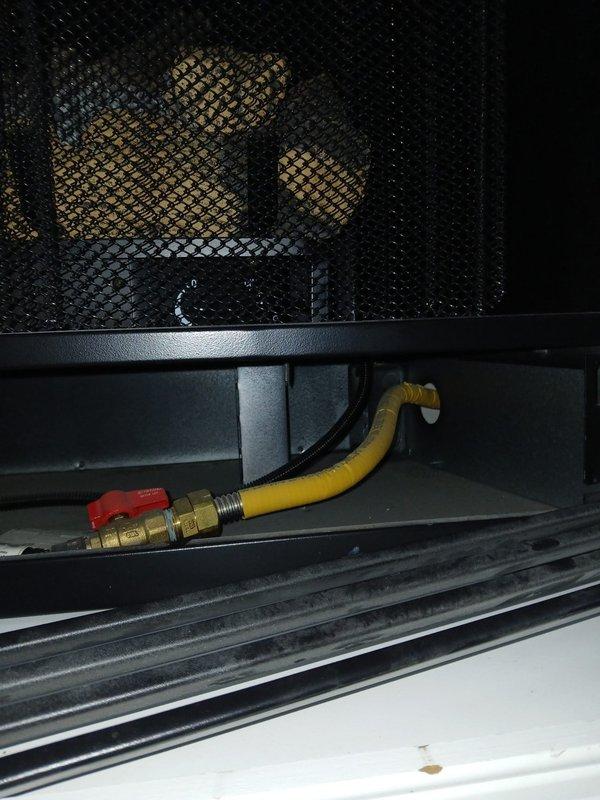 Successfully relocated laundry drain from basement floor to elevated position in nearby wall stack, eliminating previous suds issue. Completed installation of customer-supplied stainless double bowl sink and kitchen faucet. Two-person crew completed all work as specified.