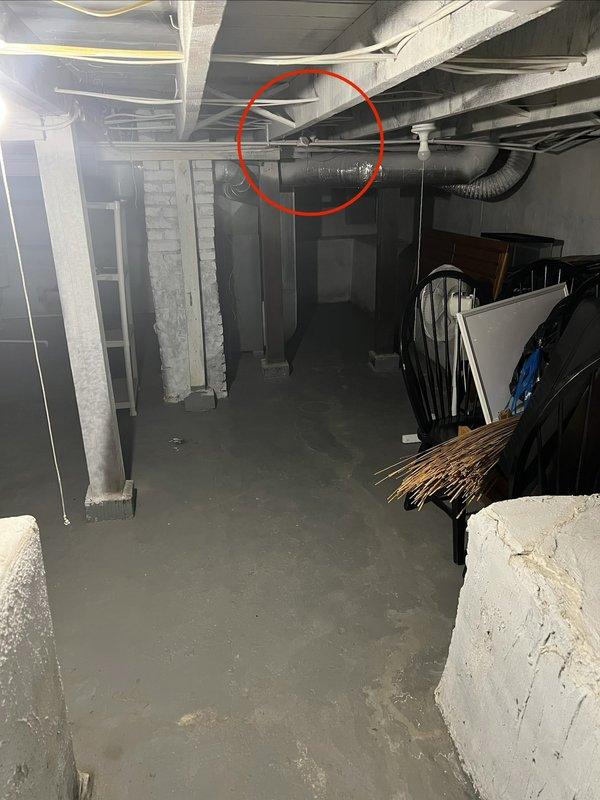 Inspected and repaired a leaking water valve in the laundry room. Identified the source of the leak at the brass valve connection point where the stainless steel braided supply line connects. Replaced the faulty valve and verified proper operation with no further leakage.