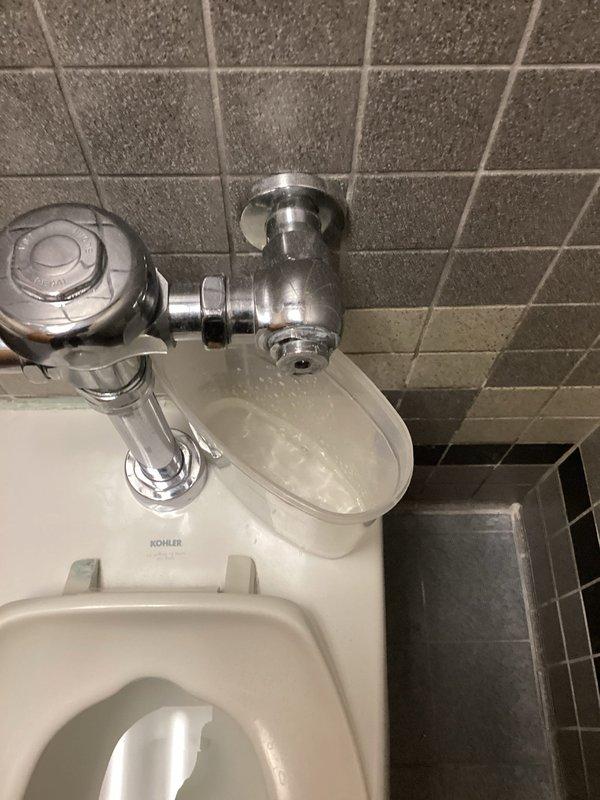 Responded to service call for toilet leak in room 184. Upon inspection, identified issue with Kohler toilet flush valve assembly. Serviced the plumbing system, addressing the leak by repairing connections in the PVC drainage network. Verified proper operation after repair.