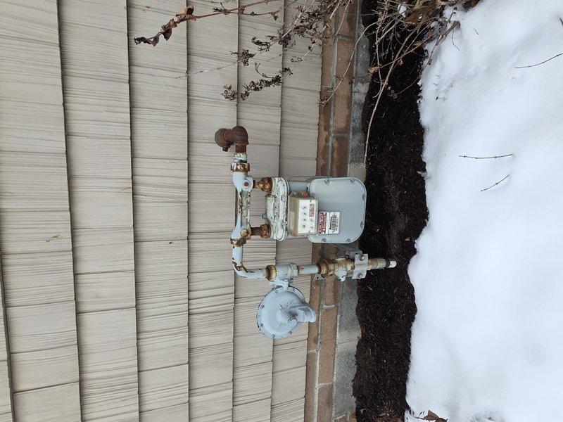 Completed installation of approximately 60 feet of 1 1/4" gas piping inside the structure. Connected new gas line to existing meter on exterior wall and ran flexible gas line to service area. Properly secured all components with appropriate brackets and ensured system integrity through pressure testing.