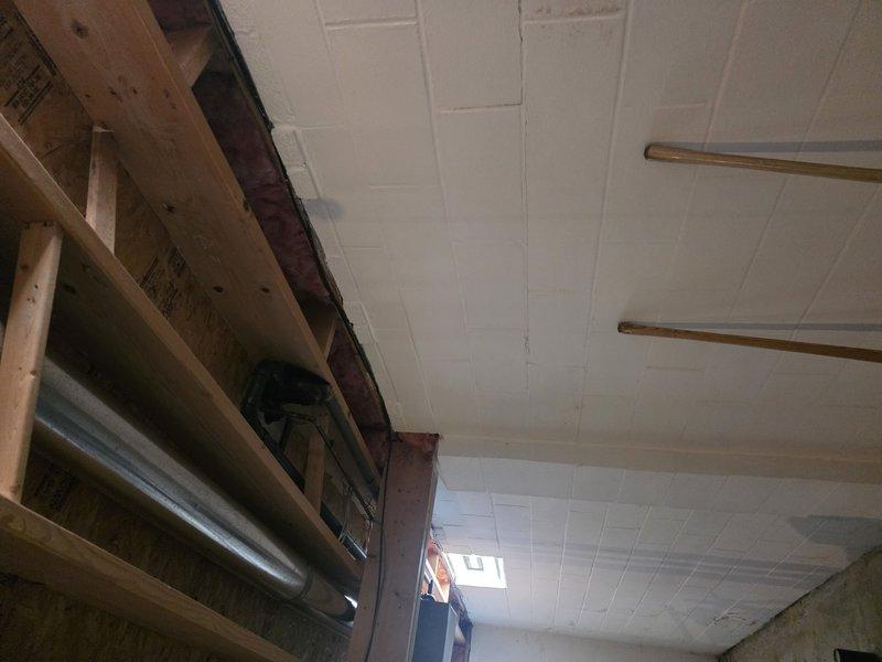 Installed approximately 10 feet of gas piping through interior structural space, connecting to the exterior gas meter. Work included proper fitting of supply lines through framed areas with insulation while ensuring code-compliant installation and secure connection to the outdoor meter unit despite winter weather conditions.