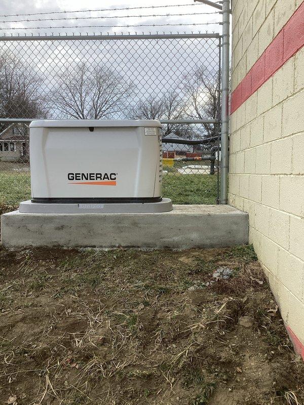 Installed approximately 60 feet of 1-1/4" gas piping to connect the building's Generac standby generator. Piping was routed along the exterior of the building, properly secured to the concrete block wall, and connected to existing gas service. System was pressure tested and verified for proper operation.