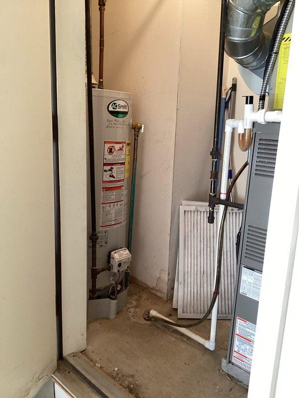 Performed diagnostic assessment on A.O. Smith 50-gallon water heater located in utility closet. Evaluated unit condition, connections, and control valve system to determine replacement requirements. Provided customer with replacement options and estimate as requested.