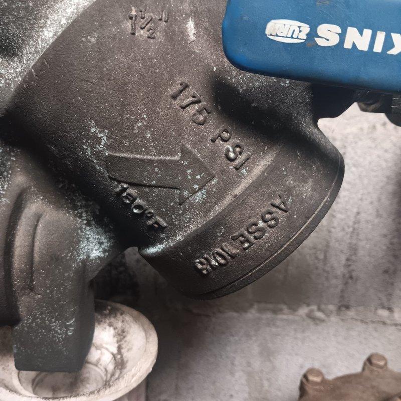 Responded to service call for water leak in closet. Inspected and serviced Wilkins Zurn valve assembly showing signs of leakage. Repaired pressure-rated fitting connected to PVC piping, eliminating the leak and restoring proper system function.