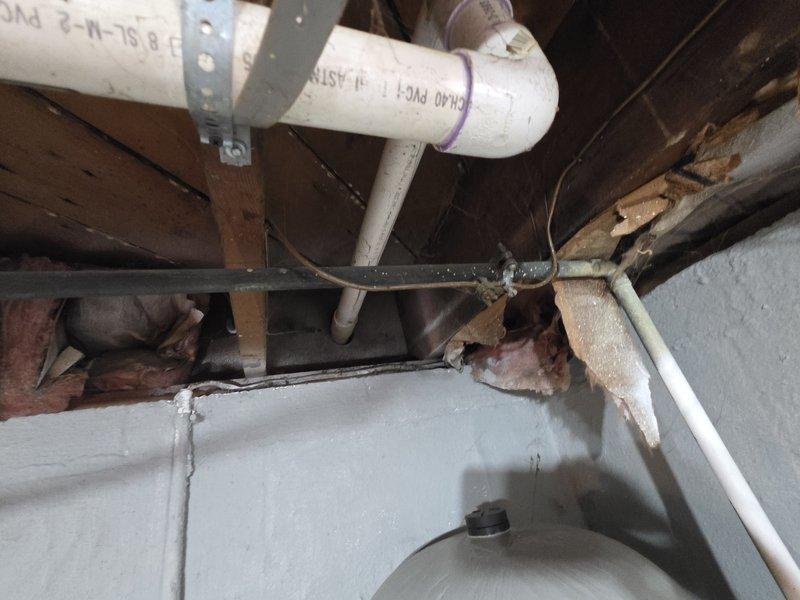 Completed installation of approximately 20 feet of 1-1/4" gas line in interior basement area. Line was properly secured with metal brackets to ceiling joists and connected to existing system. Inspected all connections for leaks and confirmed proper operation of the gas piping system.