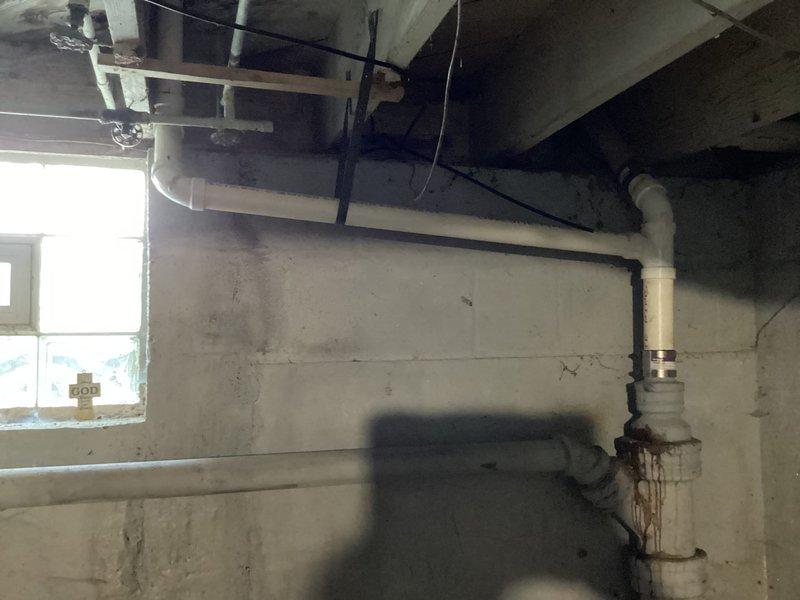 Completed kitchen drain line replumb from reducer to vent, reconnecting to main kitchen drain line. Installed new P-trap and replaced all piping to the tailpiece, ensuring proper drainage and venting compliance. Visual inspection confirmed successful installation with all connections secure and functional.