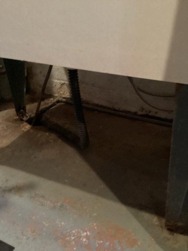 Responded to service call for basement drain clog in 60-year-old home. Inspected the drainage system, which included PVC piping with P-trap configuration, and identified significant blockage. Successfully cleared obstruction using drain snake, verified proper drainage functionality, and cleaned work area of debris.