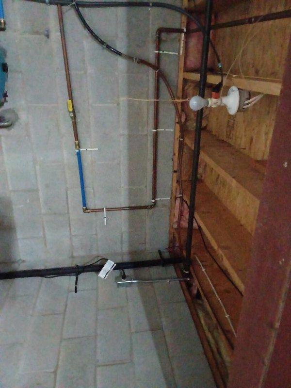 Installed approximately 10ft of gas piping on the exterior of the residence, connecting to the existing gas meter. Work included fitting copper pipes with appropriate 90-degree angles and ensuring proper connection to the pressure regulator valve. Completed installation with all necessary fittings to ensure code compliance and leak-free operation.