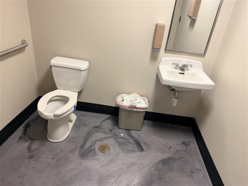 Provided pricing quote for the replacement of one toilet and one wall-mounted sink in a single restroom due to a minor leak at the toilet base. Quote included itemized breakdown of materials, labor, and tax as requested, with photo documentation of existing fixtures and bathroom conditions for accurate assessment.