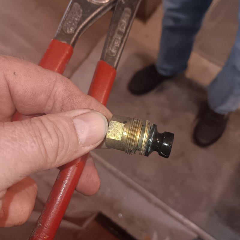 Responded to commercial property for shower valve repair. Removed and replaced faulty hot and cold control valve cartridge assembly, restoring proper temperature control and water flow to the shower fixture.