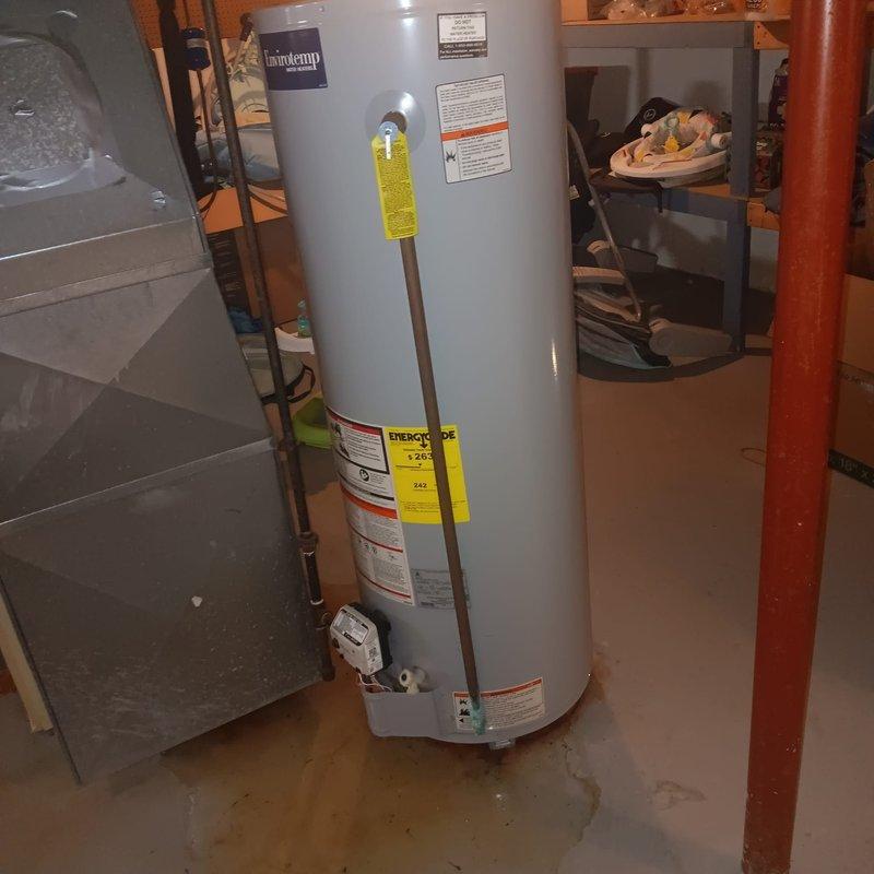 Responded to service call for shower drain leak and water heater inspection at 30-year-old residential property. Upon arrival, investigated shower drain system for reported leak and possible clog. Inspected exposed copper plumbing infrastructure in basement utility area, examining vertical and horizontal pipe runs, joints, and fittings for signs of leakage or deterioration. 

Conducted thorough examination of residential water heater unit, checking for active leaks versus condensation accumulation. Inspected all pipe connections at top of water heater, pressure relief valve, and surrounding floor area for moisture. Observed water staining on concrete basement floor and evaluated whether source was related to water heater operation or other plumbing components. Verified proper water heater operation and assessed condition of existing copper supply lines and fittings.

Documented existing plumbing infrastructure and mechanical equipment conditions through photographic evidence. Whole hom