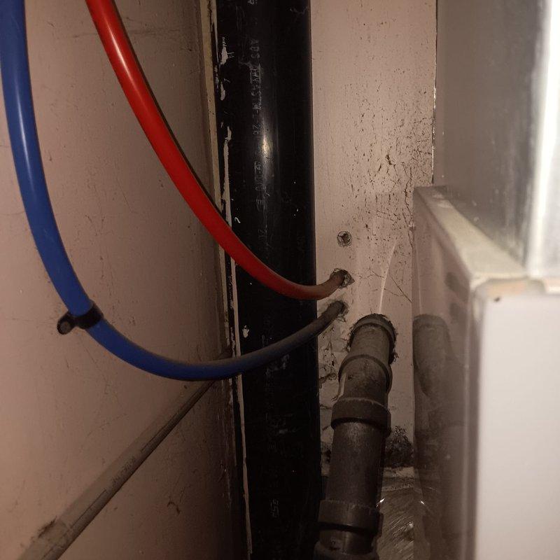 Responded to service call for disconnected sump pump discharge line causing standing water accumulation in yard. Upon arrival, located the separated drain line in basement utility area and successfully reconnected it to the sump pump outlet, restoring proper drainage function. Verified system operation and confirmed water flow through discharge line to exterior, resolving the drainage issue.