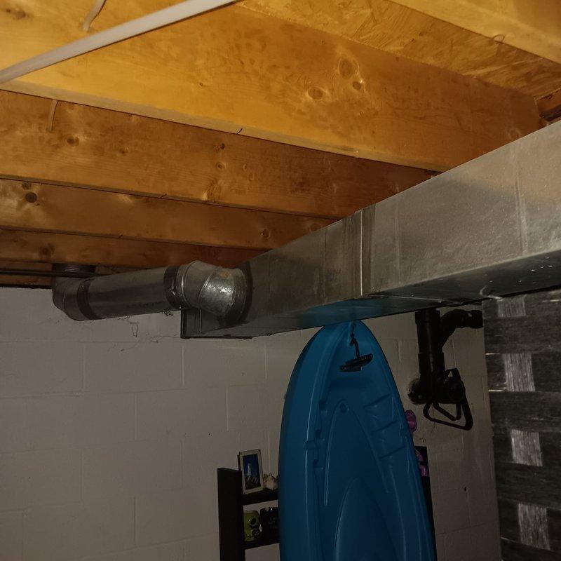 Responded to service call for disconnected sump pump discharge line causing standing water accumulation in yard. Upon arrival, located the separated drain line in basement utility area and successfully reconnected it to the sump pump outlet, restoring proper drainage function. Verified system operation and confirmed water flow through discharge line to exterior, resolving the drainage issue.