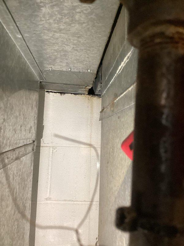 Responded to a service call for a broken and leaking pipe located near the water heater in the basement. Upon inspection, identified deteriorated copper piping showing significant age-related oxidation and corrosion, with active water leakage at the connection point. Repaired the compromised pipe section, restored proper water flow, and verified the integrity of surrounding plumbing connections to prevent future leaks.