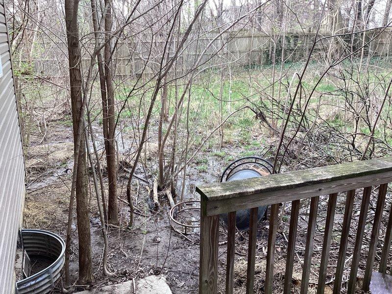 Responded to clogged wash bay drain service call and checked in upon arrival as instructed. Deployed jetter equipment to clear blockage in drain line. Successfully restored proper drainage flow to wash bay system. Photos documented site conditions and work area access from deck location.