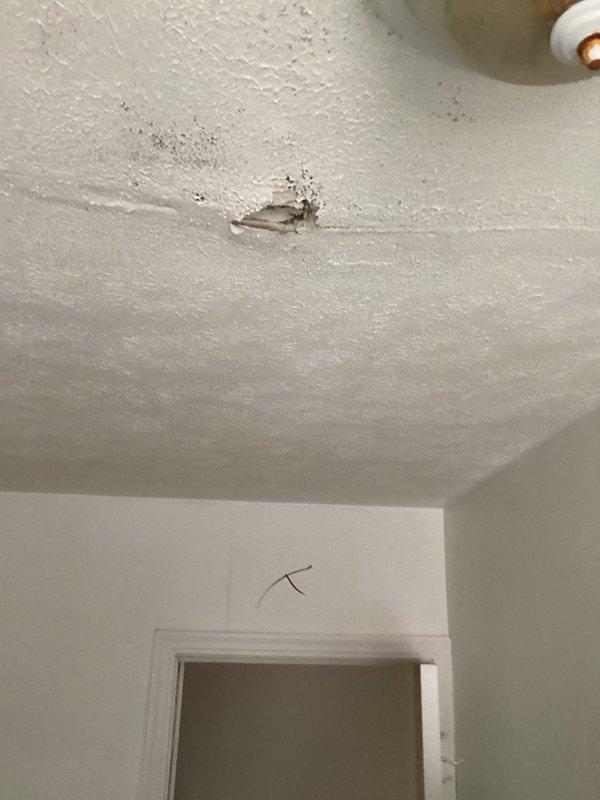 Responded to service call for assessment of broken and leaky pipes affecting multiple areas of the property. Conducted comprehensive inspection of two basement bathrooms and additional accessible areas to evaluate plumbing system integrity. Documented extensive water damage to ceiling with visible deterioration, staining, and structural compromise indicating active or recent pipe leak above the affected area. Inspected non-functional toilet with corroded flush valve assembly and supply connections showing mineral buildup and component failure. Unit tagged out of service due to mechanical failure requiring repair or replacement. Provided detailed photographic documentation of all damaged areas and compiled repair estimates for necessary plumbing corrections including pipe repairs, fixture replacement, and water damage remediation.