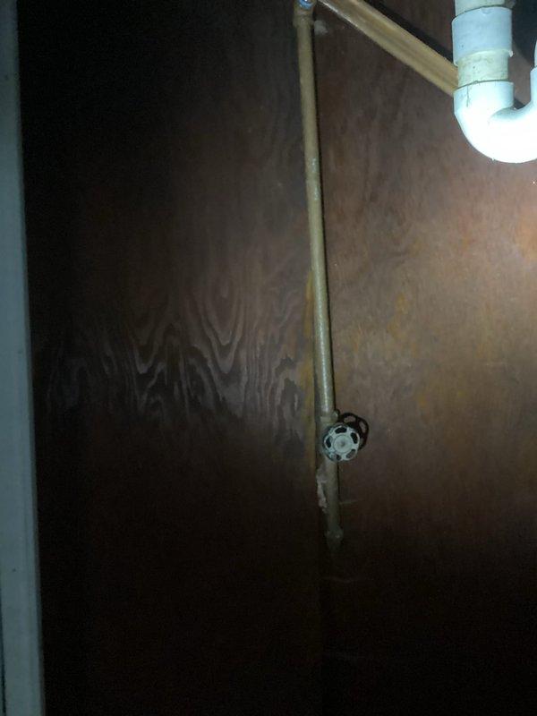 Conducted on-site assessment for whole home re-plumb estimate. Inspected existing plumbing infrastructure including water heater installation with flexible supply connectors, shut-off valves, and venting system in basement utility area. Evaluated copper supply lines and existing piping configuration throughout accessible areas to determine scope of complete residential re-piping project.