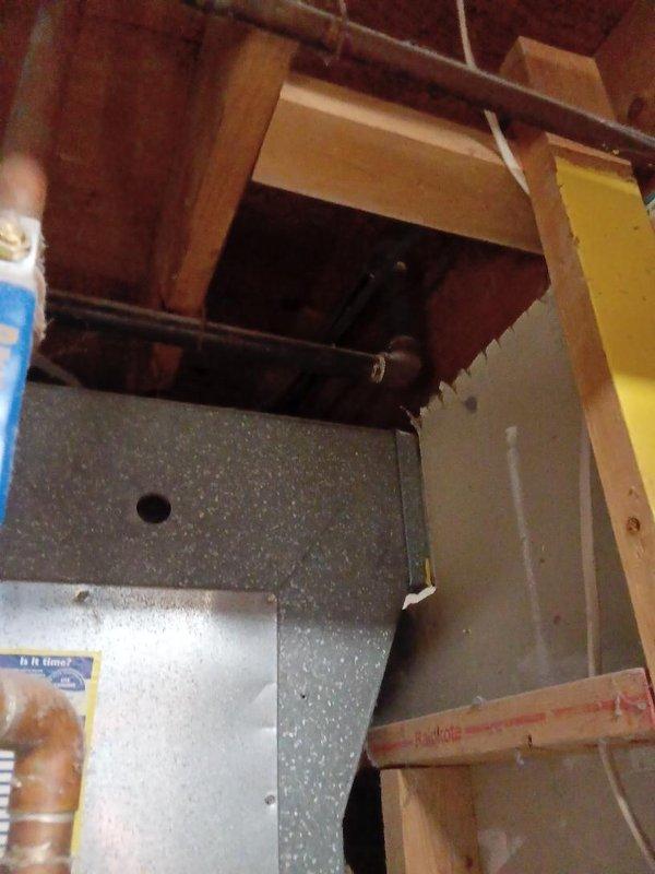 Installed approximately 40 feet of gas piping inside the building to supply fuel to mechanical equipment. Routed new gas line through interior spaces, penetrating through floor system and connecting to existing gas supply infrastructure. All connections were pressure tested and verified for proper operation and safety compliance.