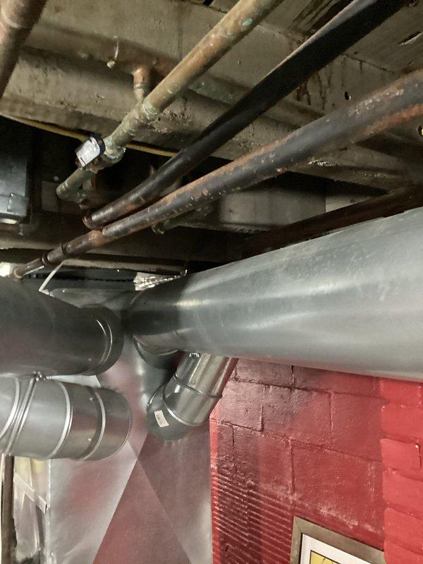 Conducted comprehensive on-site evaluation for complete home re-piping project. Assessed existing plumbing infrastructure throughout property, including basement mechanical systems with aging copper supply lines showing oxidation and patina, black insulated pipes, and metallic ductwork. Documented current pipe routing, condition of materials, and access points in utility areas and storage spaces. Provided detailed estimate for full residential re-pipe installation based on visual inspection and photographic documentation of existing conditions.