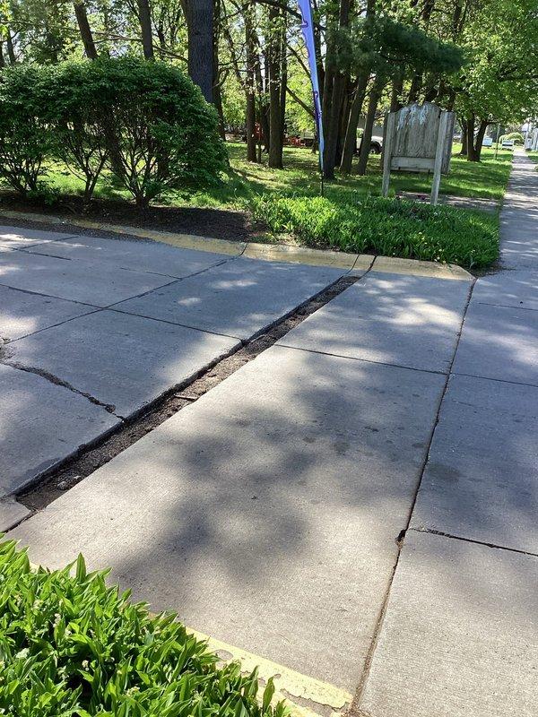 Responded to a service call regarding a former parking lot drainage system that had been filled in and blocked. Conducted on-site inspection of the area where the drain previously existed. Assessed the current condition of the filled drainage point and surrounding concrete surfaces to determine requirements for restoration. Evaluation completed to provide estimate for excavation, installation of new drainage piping, and placement of appropriate grate cover to restore proper stormwater management functionality to the commercial property.