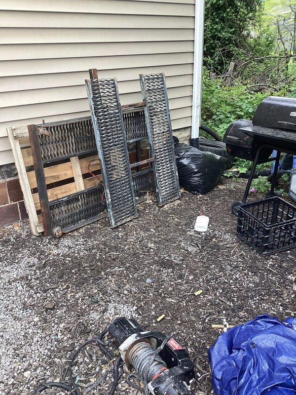Responded to main drain backup in basement approximately three months after previous jetting service. Accessed main sewer line and performed high-pressure jetting to clear recurring blockage causing drainage issues throughout the property. Documented exterior access points and work area conditions with photographic evidence for service records.