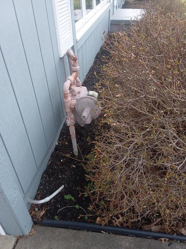 Installed approximately 30 feet of gas piping to extend service from the exterior meter connection through the foundation and into the interior of the structure. Routed copper gas line along the exterior foundation wall with proper fittings, shut-off valves, and support brackets, then penetrated through the building envelope and continued the run vertically through the interior framing to the designated termination point. All connections were properly secured, tested for leaks, and installed in compliance with local gas code requirements.