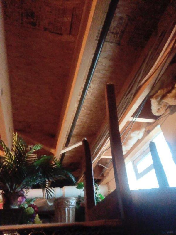Installed approximately 30 feet of gas piping for interior residential application. Routed new gas line through ceiling cavity utilizing existing access points between exposed wooden joists and around HVAC ductwork. Secured piping per code requirements and ensured proper clearances from electrical wiring and mechanical systems throughout the installation run.