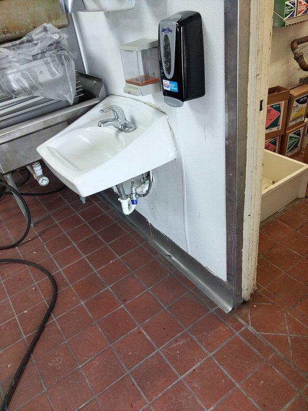 Completed dishwasher hookup connection to existing rough-in plumbing at commercial kitchen facility. Provided estimate for grease trap installation as requested by customer.