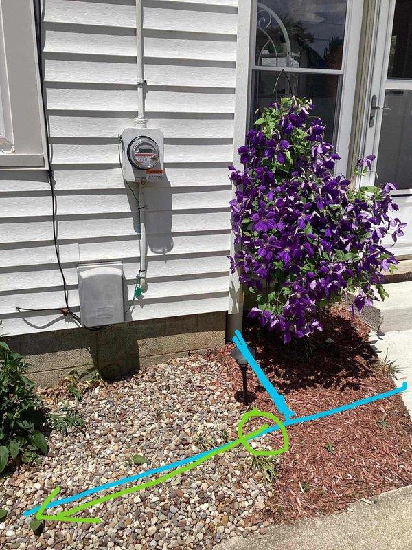 Performed video camera inspection of main sewer line from front of residence to sidewalk connection point. Camera investigation revealed a broken sewer line between the house and public sidewalk, with findings indicating structural compromise contributing to sidewalk collapse in the affected area. Documented all findings with photographic evidence showing the exterior inspection access point and marked the location of the damaged pipe section for future excavation and repair.
