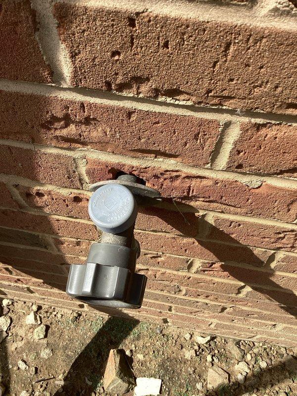 Replaced defective outdoor spigot shut-off valve per work order #XN2388374. Removed failed valve assembly and installed new shut-off valve to restore proper water control to exterior hose bib. System tested and verified operational with no leaks detected.