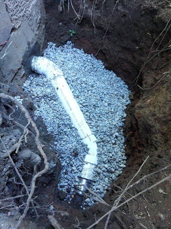 Completed a 10-foot exterior sanitary sewer lateral repair requiring excavation and permit compliance. Removed damaged section of sewer line and installed new white PVC pipe on a properly graded gravel bed for drainage support. Backfilled excavation and coordinated inspection scheduling to ensure all work met local plumbing code requirements.