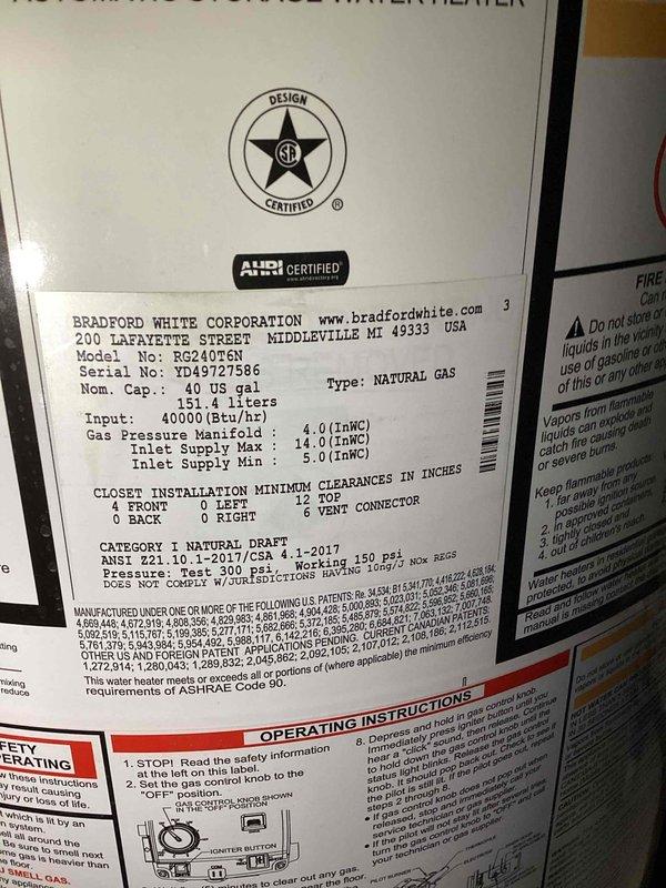 Responded to no hot water call where pilot light would not stay lit on Bradford White 40-gallon natural gas water heater (Model RG240T5N). Upon arrival, confirmed pilot light ignition issue preventing unit from maintaining flame. Inspected thermocouple, gas control valve, and burner assembly on 3-year-old unit. Documented equipment specifications and current condition with photos for service records.