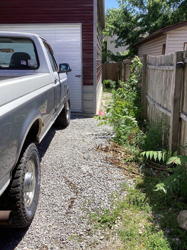 Conducted site evaluation for installation of new drain lines to residential property. Assessed access route through narrow side yard between structures, noting gravel driveway conditions and clearances for equipment and materials. Documented existing utility locations including gas shutoff valve on foundation wall. Evaluated pathway constraints including wooden privacy fencing, established vegetation, and proximity to adjacent buildings. Determined optimal routing for drain line installation from house to connection point, accounting for grade requirements and underground obstacles. Provided comprehensive estimate for drain line installation project.
