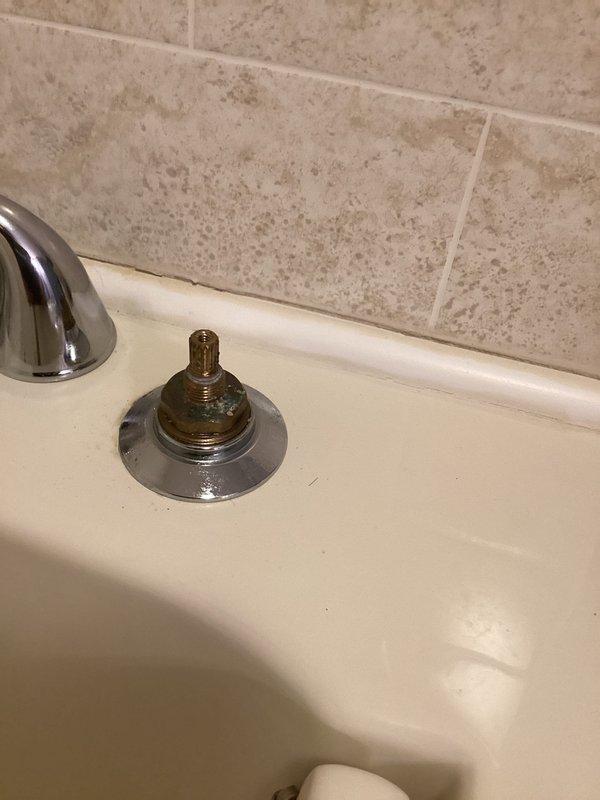 Completed follow-up repair on kitchen sink single-handle faucet that was dripping due to faulty cartridge. Previous service visit had identified the issue but required ordering specific replacement parts. Disassembled faucet handle and escutcheon to access valve assembly, removed worn cartridge, and installed new OEM replacement cartridge with seals. Reassembled faucet components, tested hot and cold water operation, and verified complete elimination of drip with no leaks detected at connections.