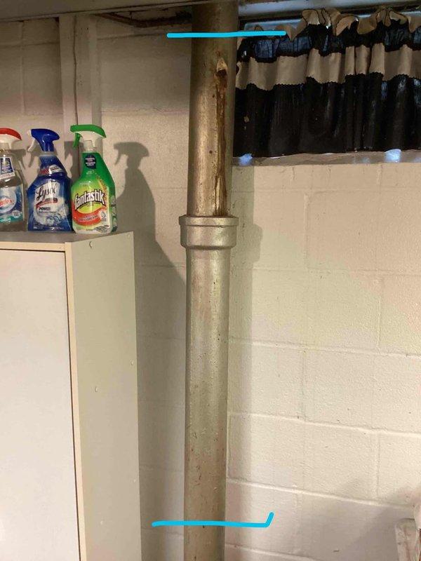 Responded to service call for suspected main line clog. Conducted thorough inspection of basement plumbing system, examining vertical drain lines and checking toilet fixtures for proper operation and potential replacement needs. Assessed drainage flow and identified blockage location in main sewer line, documenting pipe configuration and basement plumbing layout for service records.