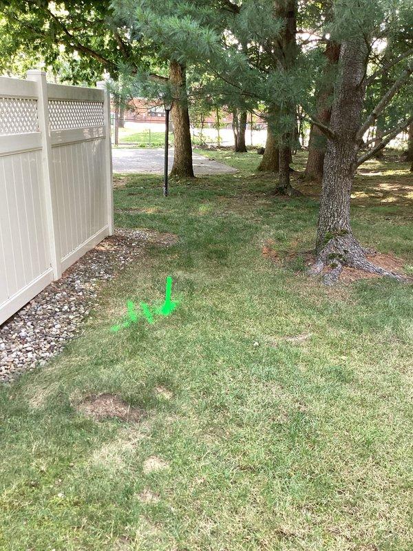 Completed main line drainage repair in front yard area following unsuccessful snaking attempts. Excavated approximately 30 feet of damaged underground drain line that had been marked with spray paint for location identification. Replaced broken riser and repaired compromised underground piping sections. Removed failed pipe sections, installed new drainage piping to restore proper flow, and backfilled excavated trench. Restored disturbed lawn area with topsoil and seed, ensuring proper grade for surface water management. All work completed in accordance with drainage assessment findings that identified blocked gutter transitions, broken riser, and underground line failures.