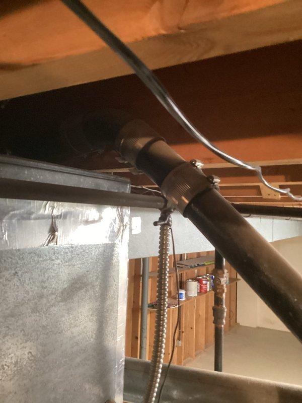 Conducted comprehensive plumbing inspection focusing on cast iron drain system in basement/crawl space area. Assessed condition of existing cast iron piping, copper water lines with foam insulation, and associated plumbing infrastructure running through floor joists. Documented current state of drain lines and provided recommendations for addressing aging cast iron drainage system to prevent future failures.