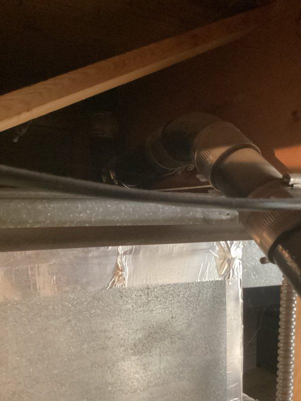 Conducted comprehensive plumbing inspection focusing on cast iron drain system in basement/crawl space area. Assessed condition of existing cast iron piping, copper water lines with foam insulation, and associated plumbing infrastructure running through floor joists. Documented current state of drain lines and provided recommendations for addressing aging cast iron drainage system to prevent future failures.