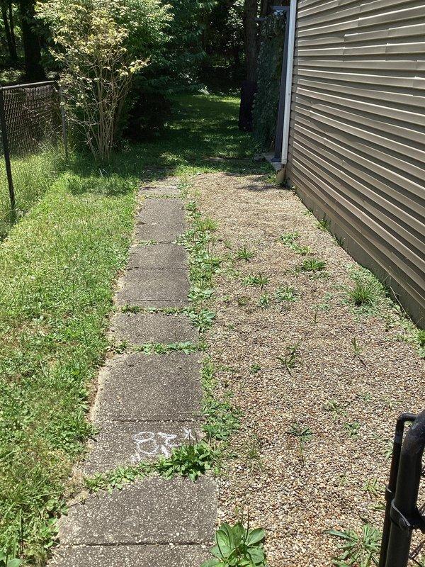 Responded to customer concern regarding water intrusion in basement with suspected underground drain line blockage. Conducted exterior property inspection to assess potential drainage issues and identify water entry points. Documented exterior conditions including pathway drainage patterns, ground surface conditions, and exterior grade around foundation. No active plumbing repairs performed during this diagnostic visit.
