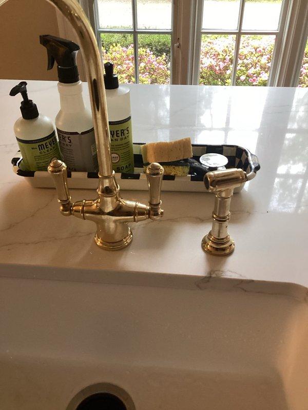 Responded to a leaking kitchen faucet in a 99-year-old home. Upon inspection, identified a failed cartridge valve with deteriorated O-rings and mineral buildup causing the leak. Removed the old cartridge, which showed significant corrosion and calcium deposits consistent with the age of the plumbing system. Installed a new replacement cartridge with fresh seals to restore proper function and eliminate the leak. Tested the faucet operation to confirm no drips and proper water flow. Documented the work with photos of the removed cartridge showing the extent of wear and the completed installation.