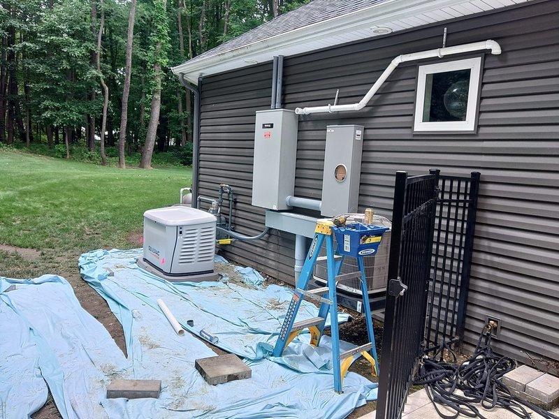 Installed 10 feet of natural gas piping to an exterior tap location, connecting to the existing gas meter assembly mounted on the building's exterior wall. The installation included proper routing of gray PVC piping with secure mounting brackets, integration with the existing meter configuration featuring a red shut-off valve, and copper flexible connectors at the meter connections to ensure code-compliant gas delivery to the designated tap point.