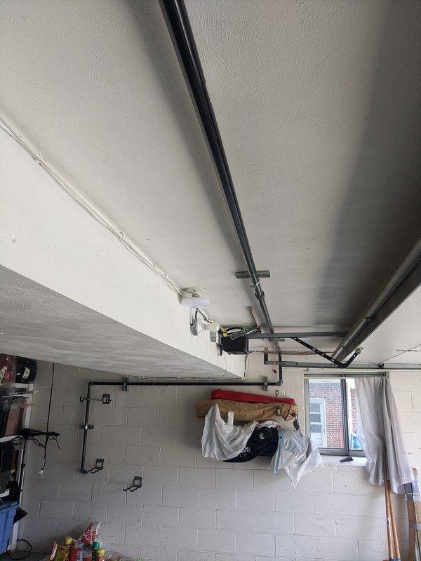 Installed 20 feet of gas piping from exterior tap location to service the garage area. Connected copper gas line to existing meter with appropriate shut-off valves and fittings, then routed piping through exterior wall into garage space. Obtained required permit through Summit County and completed installation per local code requirements.